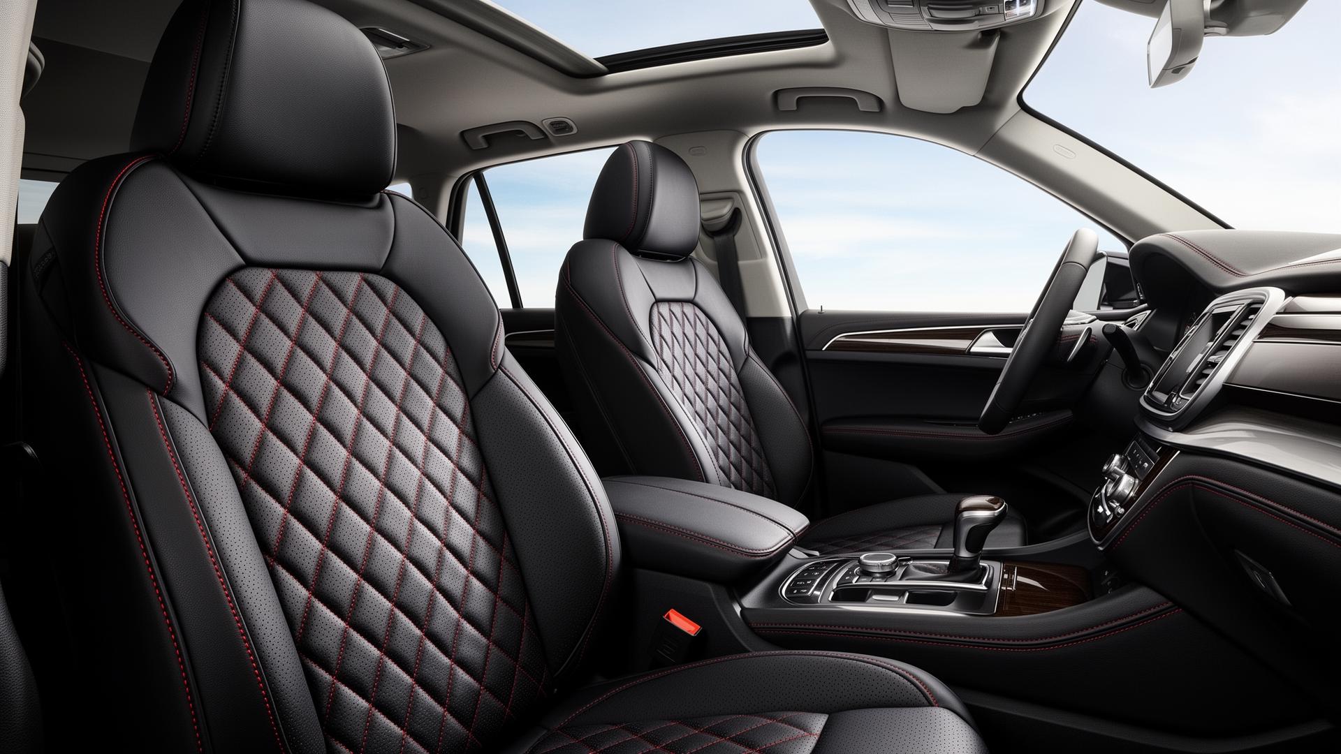 Custom fit black leather seat covers with red stitching